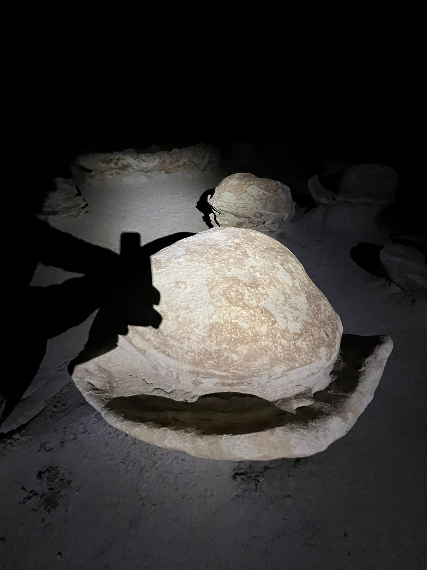 Cracked Eggs formation lit under the night sky