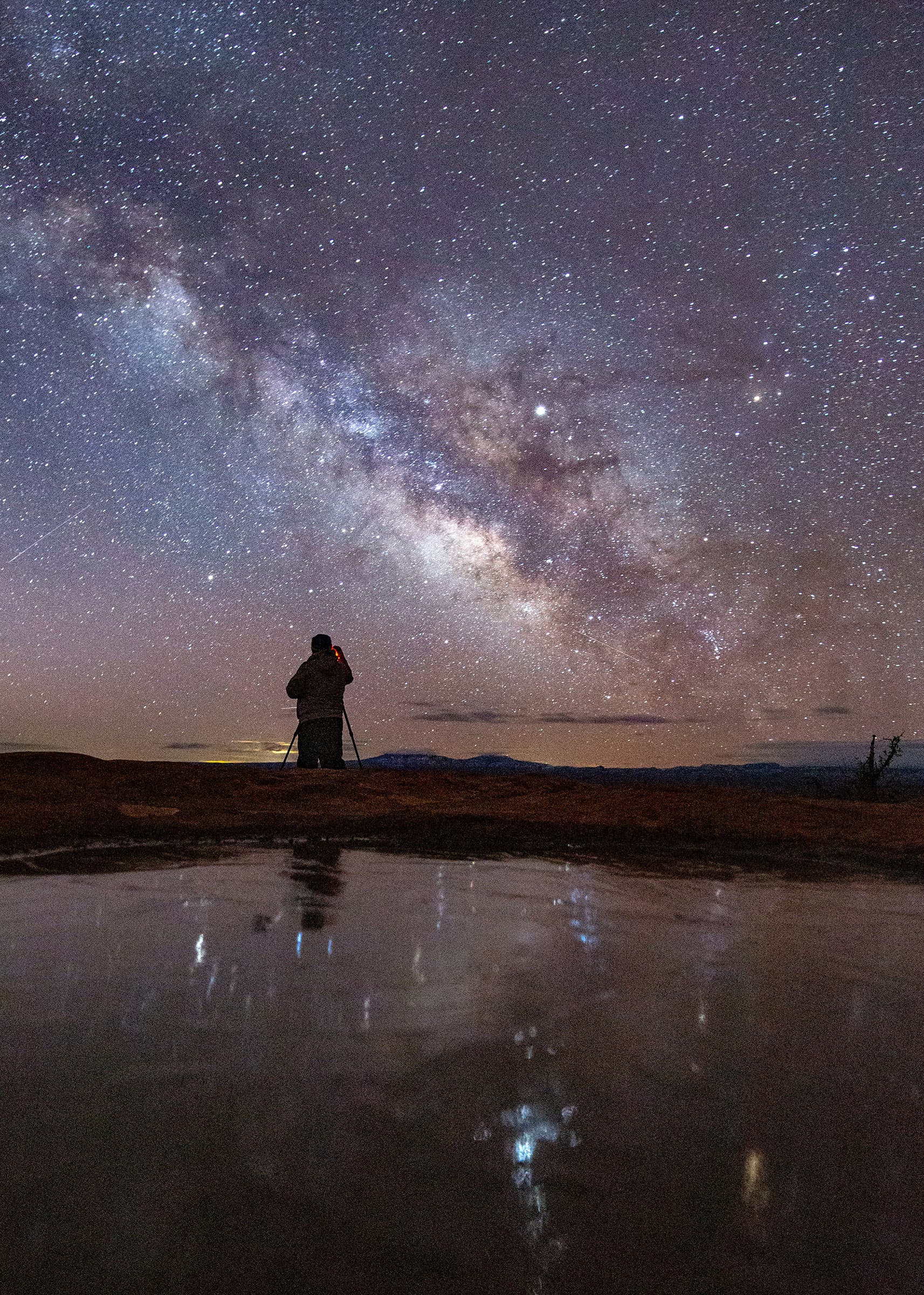 Aaron King photographing from a canyon overlook
