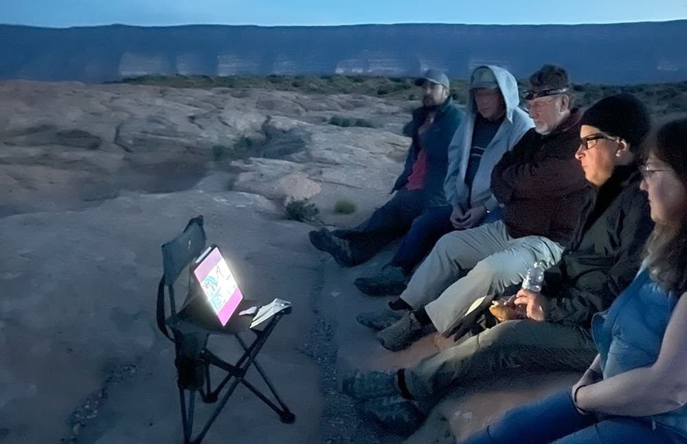 Workshop participants passing time while waiting for night-sky timing