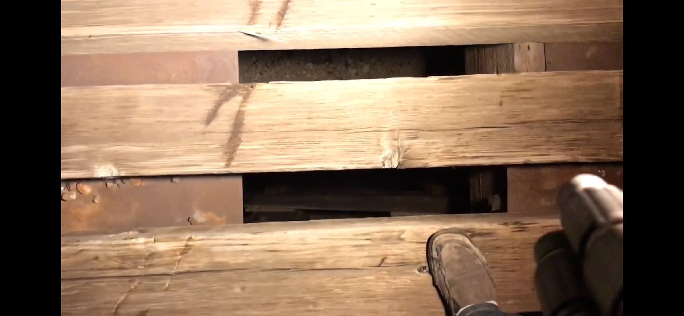 Rail ties and uneven terrain near a night photography location